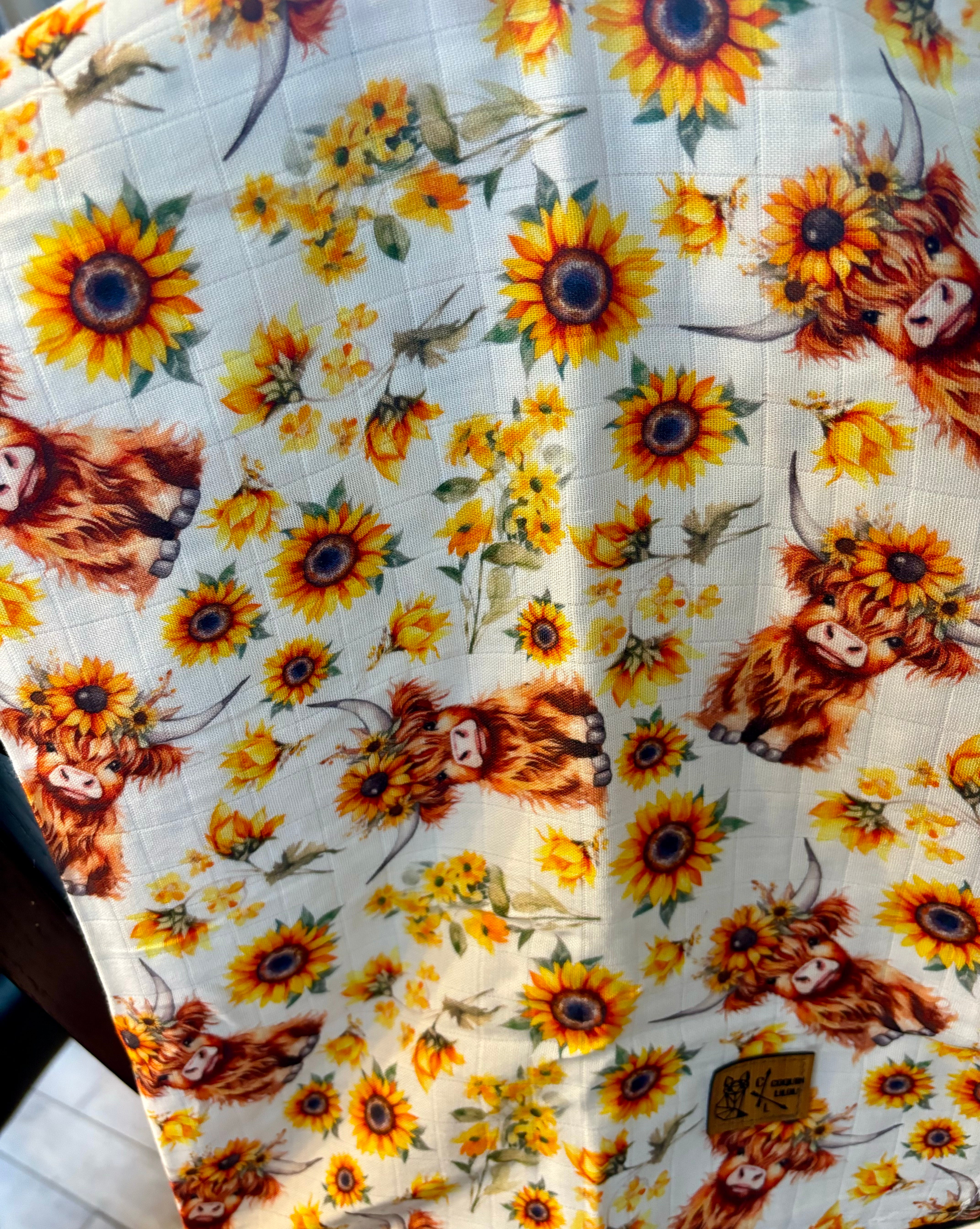 Doudou mousseline highland tournesol